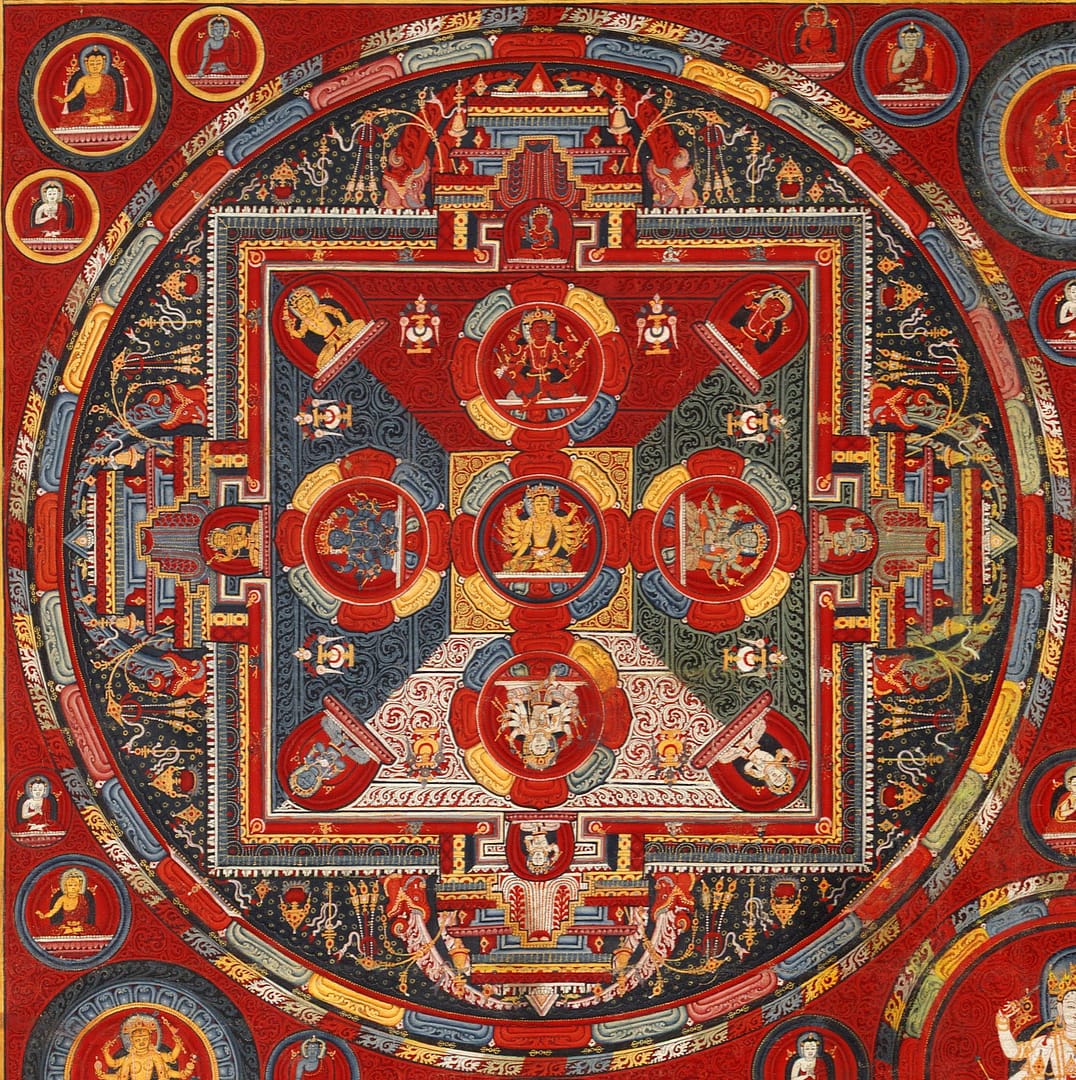 Top right of the Vajravali Mandala (rich red background with multicolored Buddhist imagery) at Ngor Monastery, Tibet
