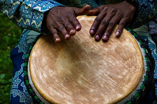 Hands drumming image by photographer Caleb Toranzo via Unsplash